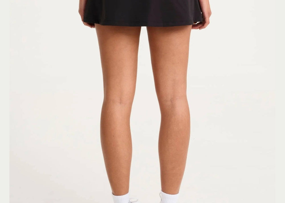 ALLFENIX CloudCore Active Skort in Onyx black, back view