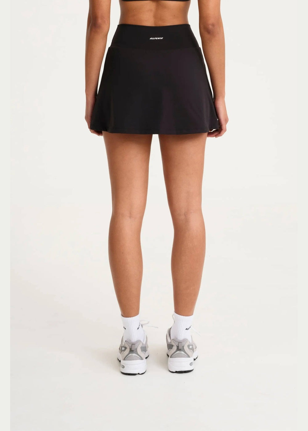 ALLFENIX CloudCore Active Skort in Onyx black, back view