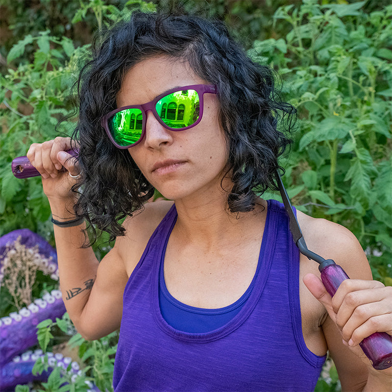 Goodr OG Gardening With a Kraken sunglasses worn outdoors