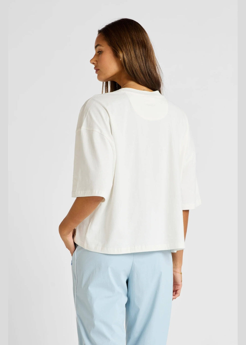 ALLFENIX Oversized Cropped Tee – Chalk – rear three-quarter view