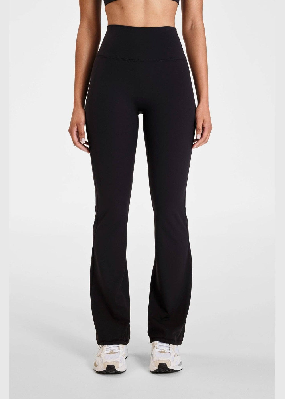 ALLFENIX CloudCore Flared Legging in Onyx black, front view showing flared legs