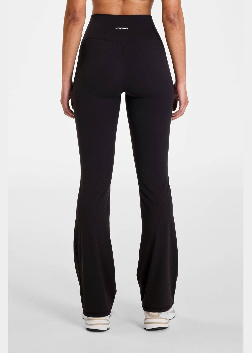 ALLFENIX CloudCore Flared Legging in Onyx black, back view