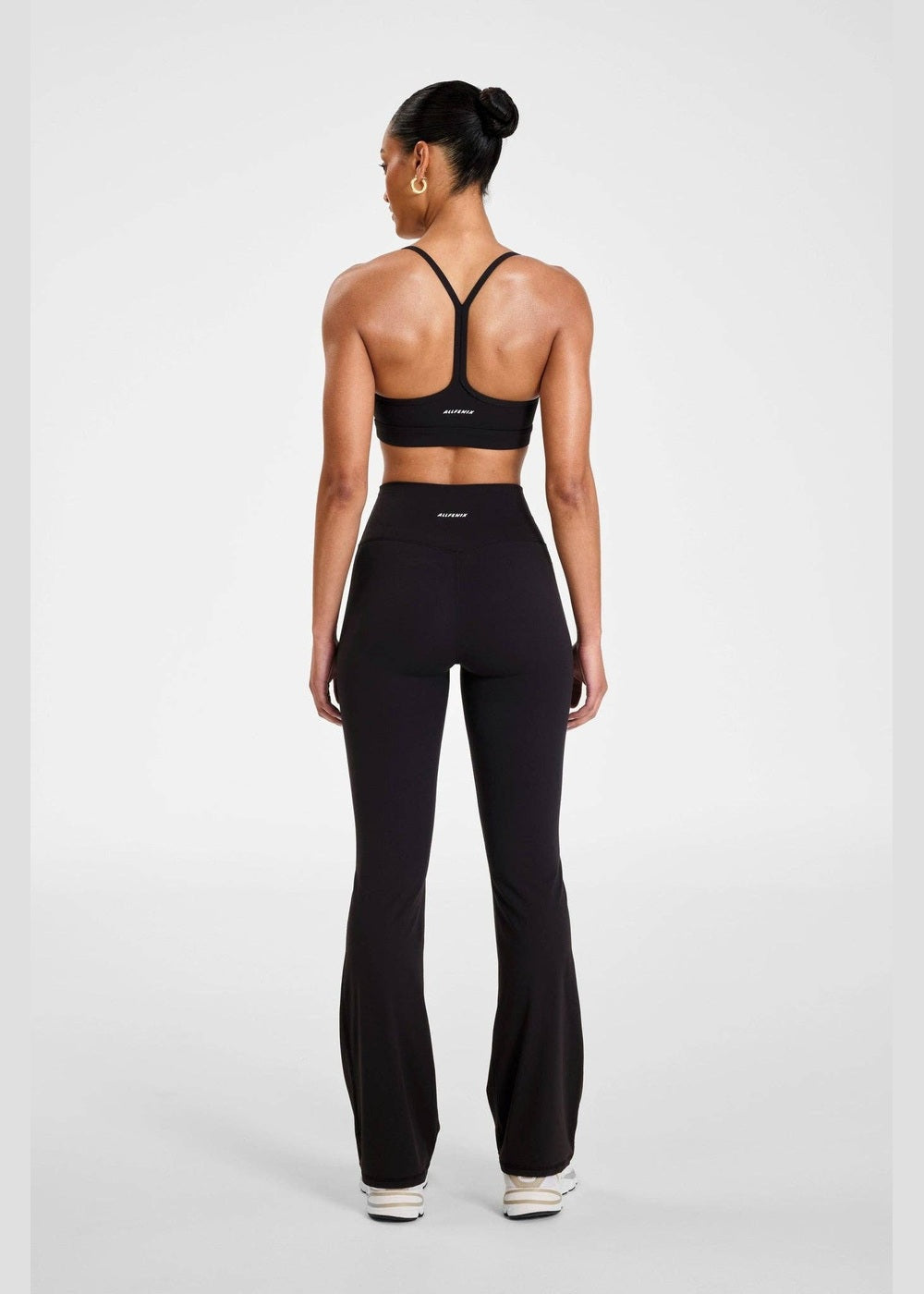 ALLFENIX CloudCore Flared Legging in Onyx black, full outfit from back