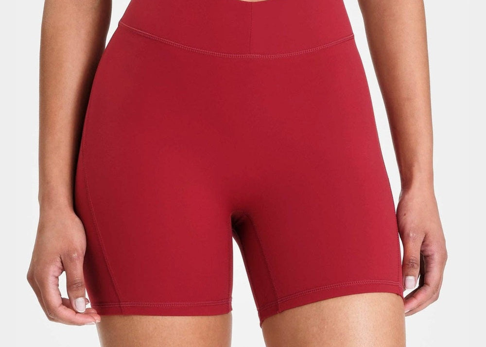 ALLFENIX CloudCore Sculpting 5" Bike Short in Cherry, front view showing V-waistline