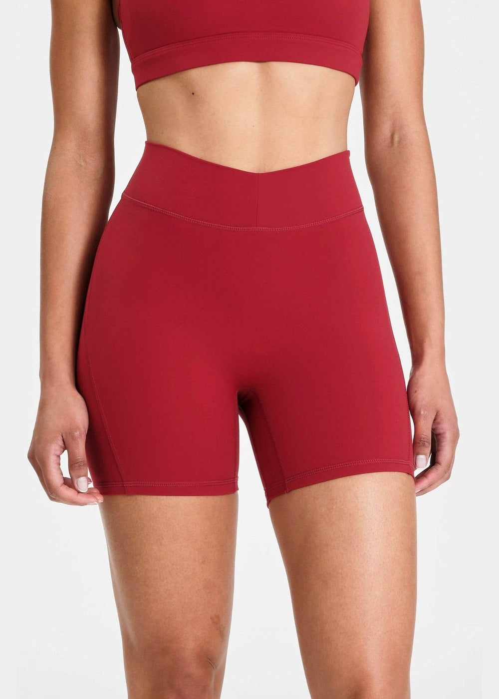 ALLFENIX CloudCore Sculpting 5" Bike Short in Cherry, front view showing V-waistline
