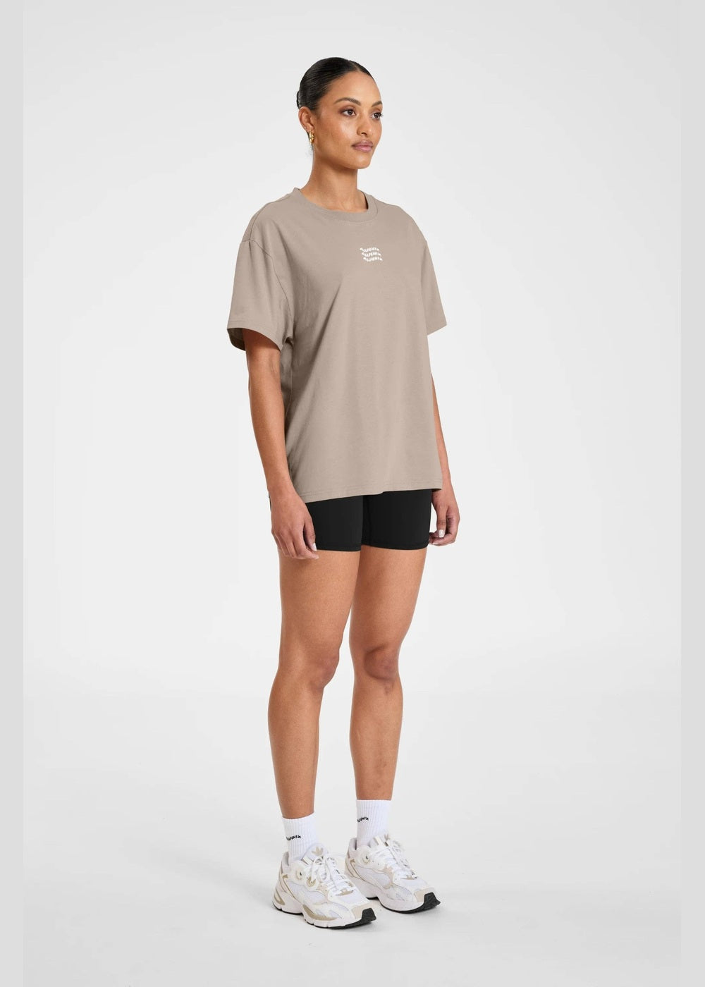 ALLFENIX Waves Logo Tee in Taupe, full outfit at an angle