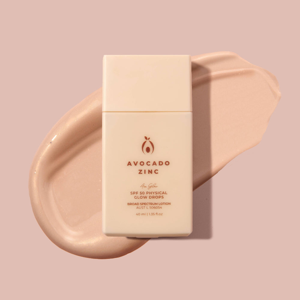 Avocado Zinc lotion bottle on a pink background