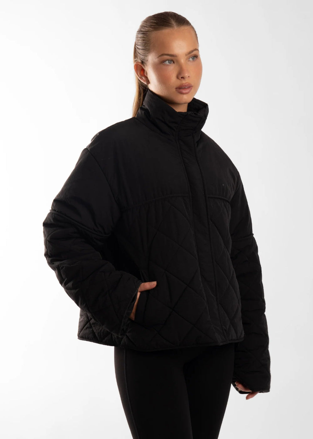 Active Basics Quilted Puffer Jacket in Onyx, three-quarter view