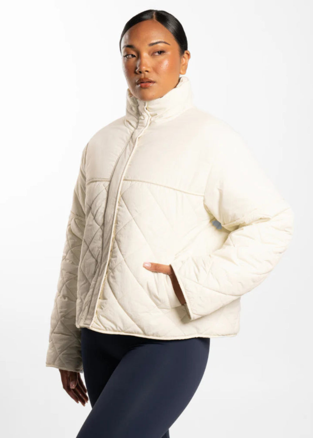 Active Basics Quilted Puffer Jacket in Off-White, three-quarter view