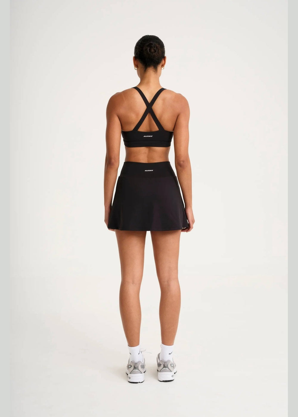 ALLFENIX CloudCore Active Skort in Onyx black, full outfit from back