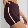 ALLFENIX CloudCore™ Contrast 5" V-Waist Bike Short – Double Espresso/Rose Quartz – waist and side-panel detail