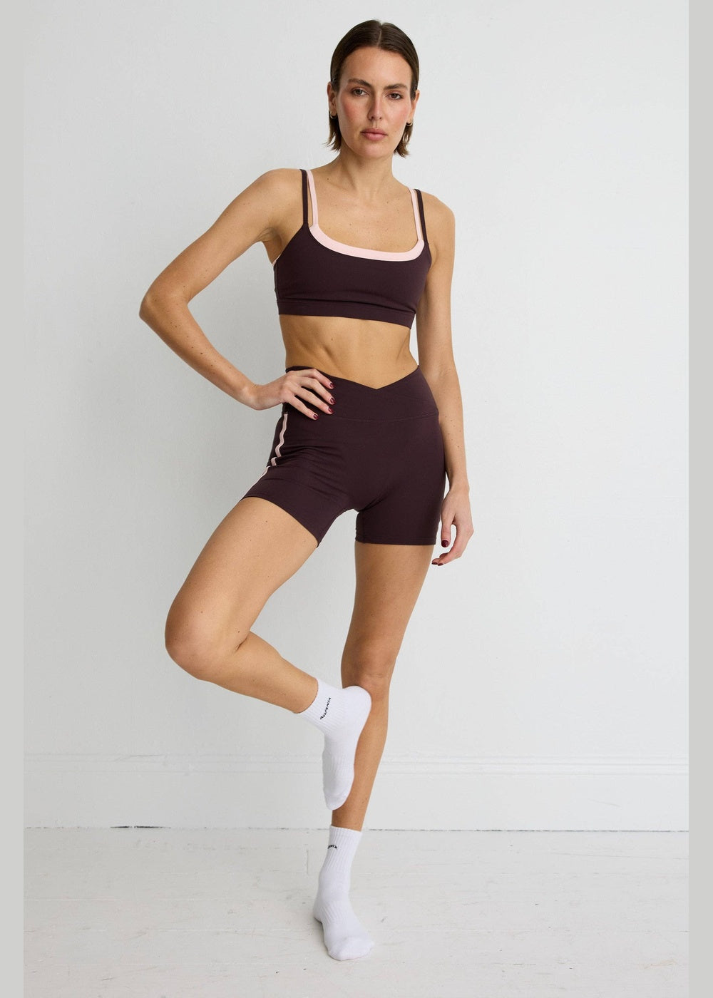 ALLFENIX CloudCore™ Contrast 5" V-Waist Bike Short – Double Espresso/Rose Quartz – front styled view
