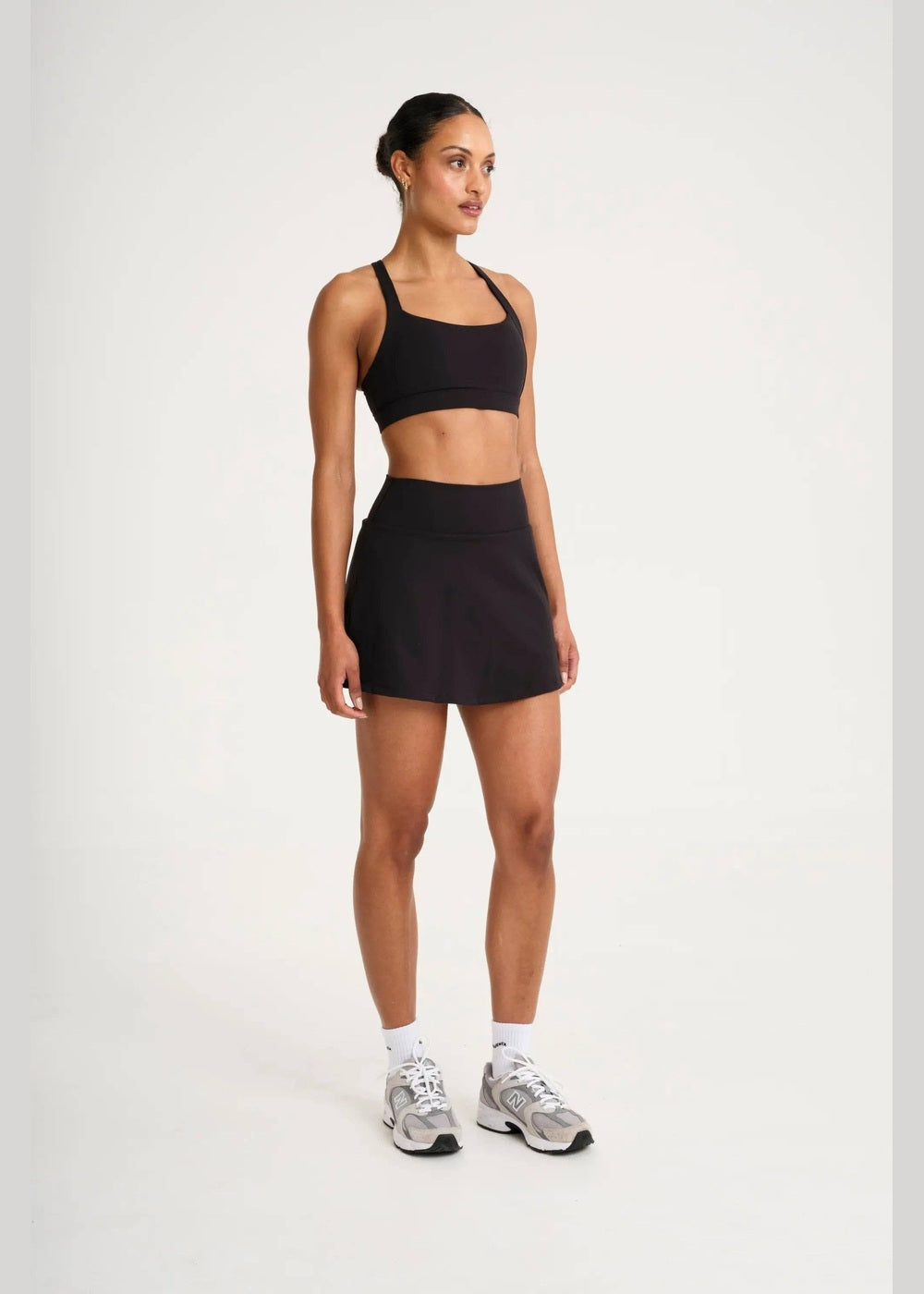 ALLFENIX CloudCore Active Skort in Onyx black, three-quarter view