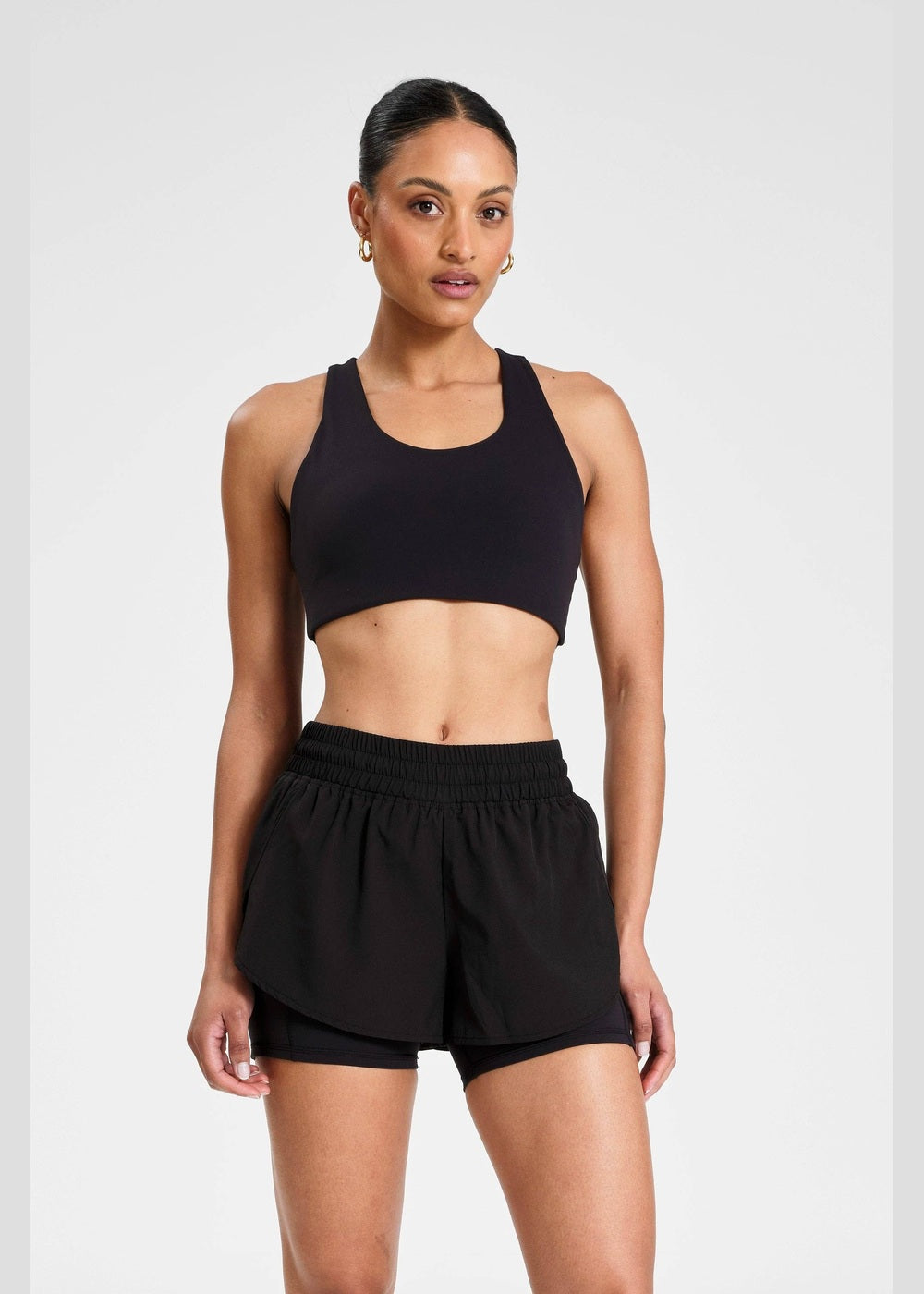 ALLFENIX EcoSculpt Running Short in Black, front outfit detail