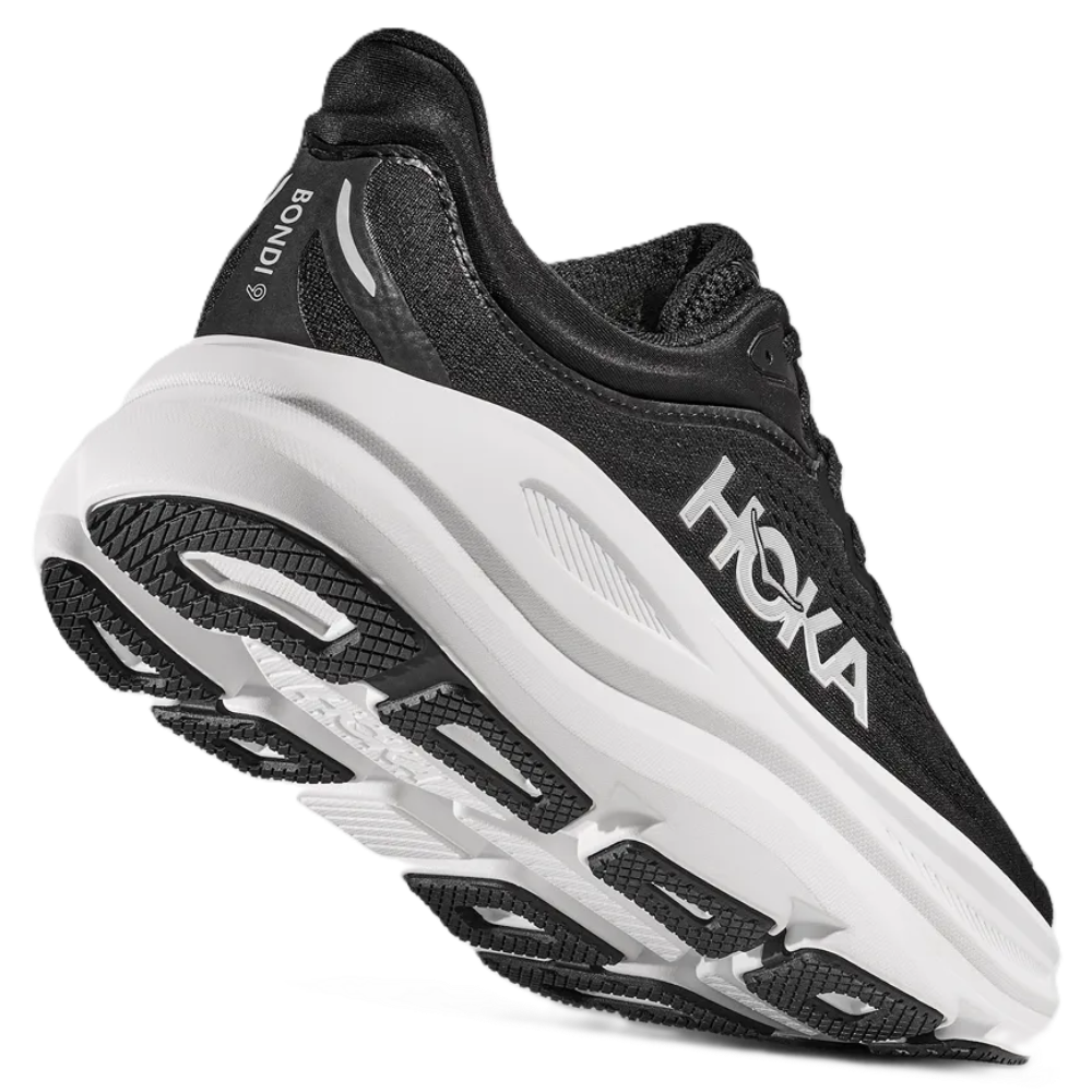 HOKA Bondi 9 Men’s X-Wide Black and White running shoe side angel view